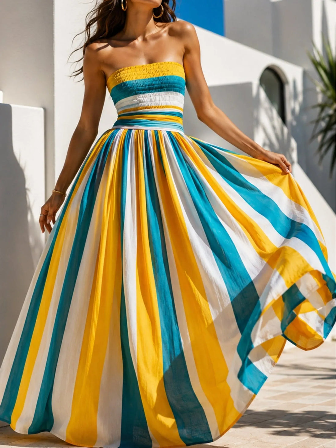 Yellow and blue striped smocked strapless maxi dress