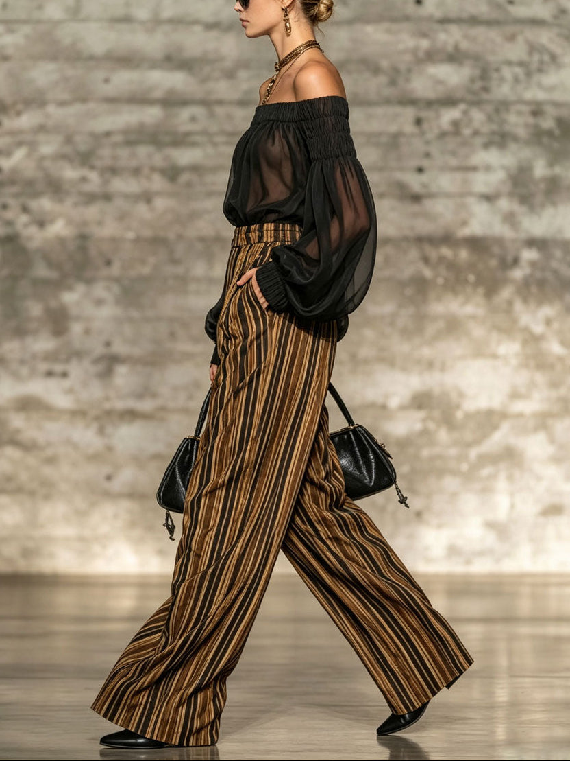 Elegant black off-the-shoulder top and striped wide-leg trousers set