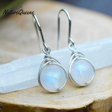 Round winding opal earrings